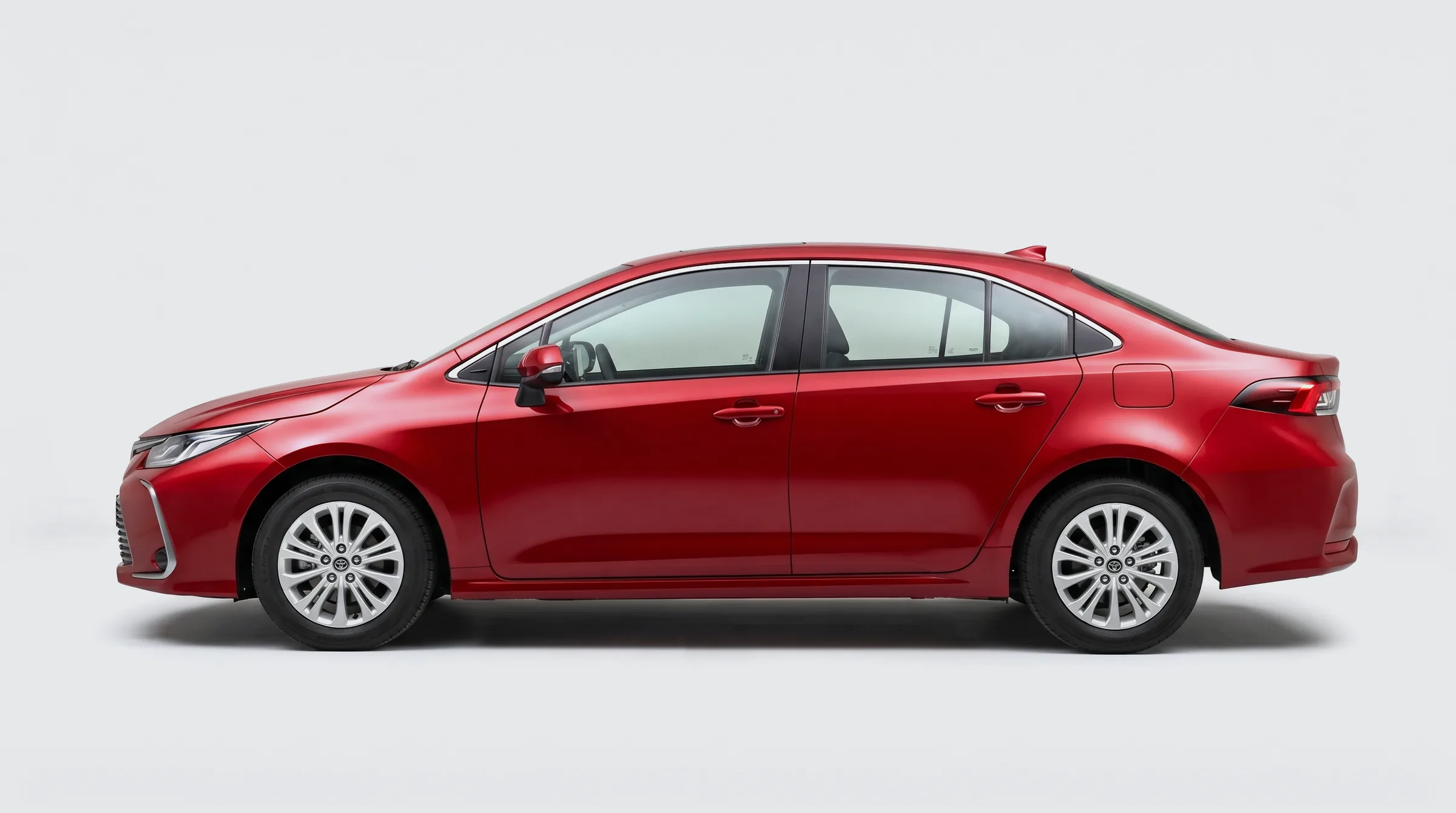 Toyota Corolla красного цвета сбоку, с размерами кузова, визуализация